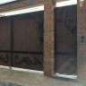 Ворота распашные, заполнение ДКП с элементами ковки